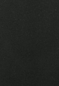 Solid dark gray textured fabric with subtle diagonal lines forming a diamond pattern, even lighting, no other objects or actions.