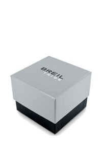 Boîte cadeau Breil Tribe avec un dessus gris et une base noire, présentant une texture lisse et un logo supérieur audacieux en lettres noires. Forme carrée.