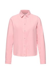 Chemise rose clair à manches longues avec col classique, boutons pression et ourlet droit, présentée sur un fond blanc.