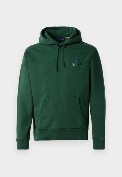 Gröna hoodien har en framficka, dragsko på huvan och broderad logotyp. Tillverkad av mjukt tyg med en strukturerad yta.