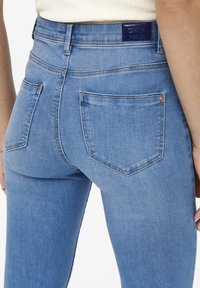 ONLY ONLWAUW LIFE FLARE  - Flared jeans - light medium blue