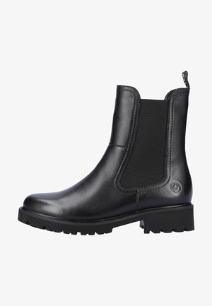 Bottine en cuir noir avec panneaux latéraux élastiques, une semelle texturée pour une meilleure adhérence, et un petit accent logo sur le côté extérieur.