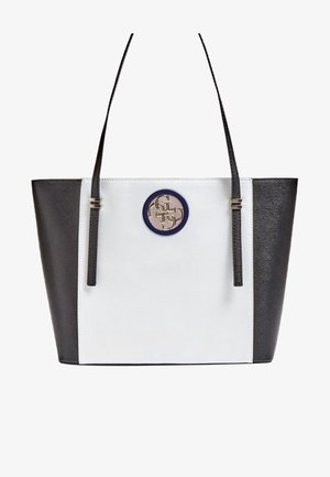 Sac fourre-tout rectangulaire noir et blanc avec des bretelles fines noires et un logo circulaire au centre devant.