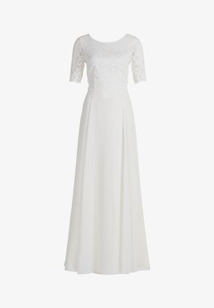 Fehér ruha rövid csipke ujjakkal, egy szabott csipke felsőrésszel és egy laza szoknyával. Simább anyag, puha tapintású, térd alatti szegéllyel.