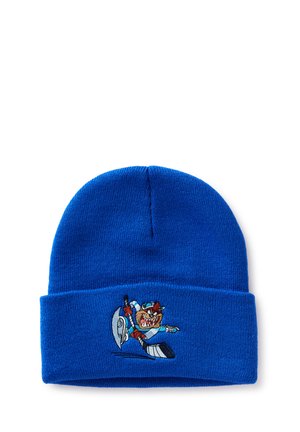 Bonnet en tricot bleu avec personnage de dessin animé brodé jouant au hockey sur glace, tenant un bâton et un palet en position d'action.