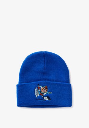Gorro de punto azul con un personaje de dibujos animados bordado jugando hockey sobre hielo, sosteniendo un palo y un disco en una pose de acción.