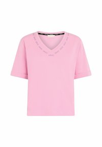 T-shirt rosa a maniche corte realizzato in tessuto morbido, con scollo a V e cuciture decorative attorno al collo. Vestibilità rilassata con maniche arrotolate.