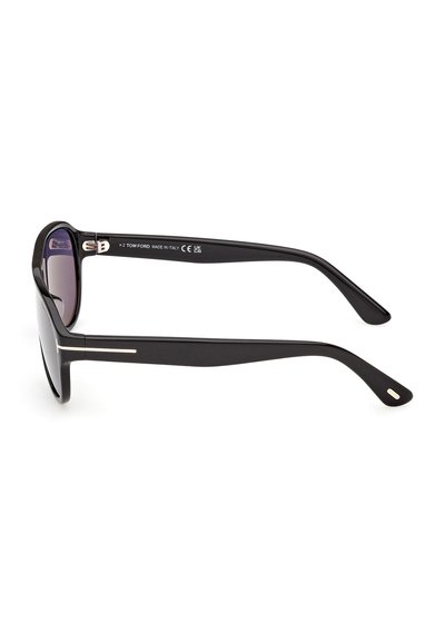 Lunettes de soleil rectangulaires noires avec de fines lignes argentées sur les branches, fabriquées en Italie, vues de profil sur un fond blanc.