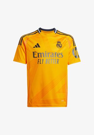 Maillot de football jaune à manches courtes, arborant un motif géométrique, un col rond et une marque "Emirates FLY BETTER" en gris.