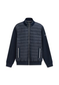 Granatowa pikowana kurtka z zapięciem na zamek, zamykanymi kieszeniami po bokach, ściągaczami na mankietach oraz stójką.