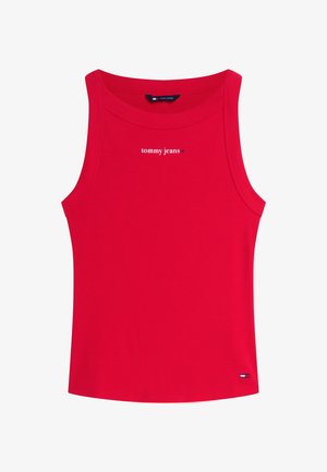 Piros ujjatlan bordázott trikó, amelyen a mellkason "tommy jeans" felirat, az alján pedig egy kis Tommy Hilfiger zászló található.