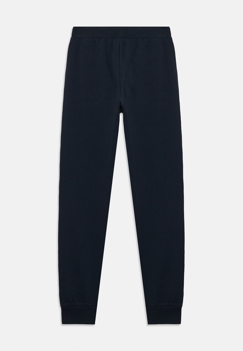 Pantaloni jogger blu navy in cotone, con vita elasticizzata, gambe affusolate e polsini a coste. Tessuto liscio, design semplice.