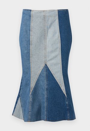 Denim skirt featuring a color-block design with different shades of blue, a flared hem, and visible stitching details for structure.