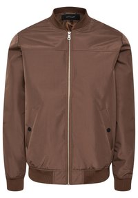 Brun bomberjacka med en jämn, matt yta. Har dragkedja, ribbade muddar, sidofickor och en rundad krage.