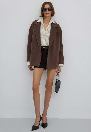 - Kurtka przejściowa