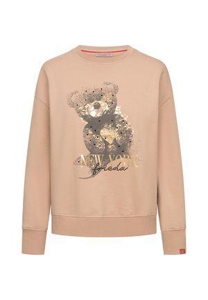 Beige sweatshirt featuring a bear graphic with gold accents and "NEW YORK" text, round neckline, and ribbed cuffs. Soft fabric texture.