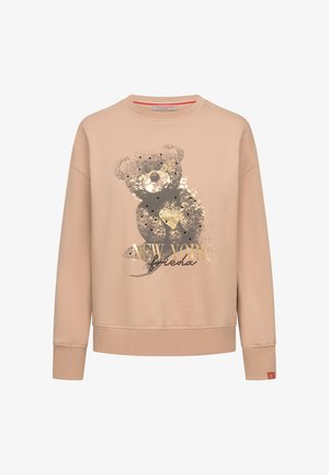 Beige sweatshirt met een berenafbeelding met gouden accenten en de tekst "NEW YORK", ronde halslijn en geribde mouwen. Zachte stof.