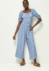 Next SHORT SLEEVE - Overal - blue ikat print