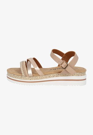 Beige strappy sandal with textured straps, braided accents, cushioned footbed, and a white outsole with a textured grip pattern.