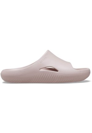 Helle rosa Clogs zum Hineinschlüpfen aus glattem Material, mit offenen Seiten, strukturiertem Sohlen und dezentem Branding auf dem Obermaterial.