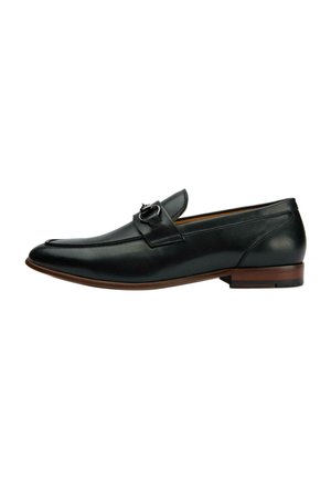 Black leather loafers with a smooth texture, a pointed toe, and a decorative buckle on the vamp. Leather sole with a slight heel.