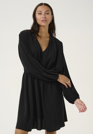 Black dress with long, voluminous sleeves and a V-neckline. Smooth fabric, cinched waist, and flowing skirt. Minimalist design.