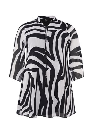 Zwart-witte tuniekshirt met zebraprint, voorzien van een kraag, 3/4 mouwen en een trekkoord met franjes. Gemaakt van een lichtgewicht, doorschijnende stof.