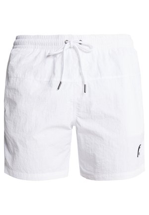 Weisse Shorts aus leichtem Stoff mit elastischem Bund und Kordelzug. Enthält ein kleines Logo auf der unteren linken Seite.