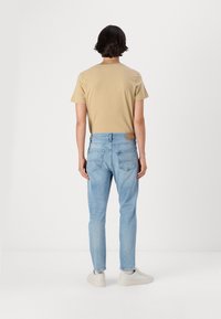 Tommy Jeans DAD REGULAR - Relaxed fit -farkut - denim light