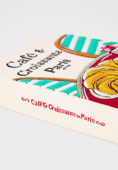 Embroidered book cover titled "Café & Croissants de Paris," featuring a colorful design with a croissant and striped pattern in teal and red.