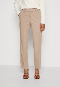 Beige tailored trousers with a straight-cut design and belt loops. Made of smooth fabric, featuring side pockets and a clean finish.