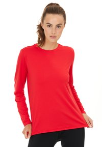 Rotes langärmliges Sportshirt mit Rundhalsausschnitt, hergestellt aus glattem, dehnbarem Stoff. Verfügt über einen lässigen Schnitt und ein schlichtes Design.