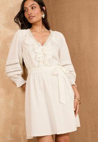 Unselected, ivory