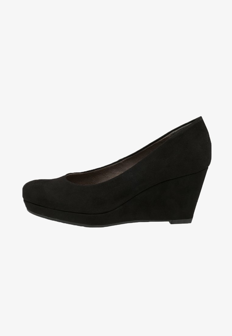 Black suede wedge heel shoe with a rounded toe and smooth texture; features a moderate height wedge for added stability.