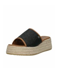 Infradito in tessuto intrecciato nero con un ampia fascia, accentuate in pelle beige, e una suola piatta in juta intrecciata. Texture studiata per garantire grip e comfort.