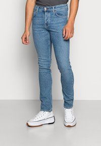 Nudie Jeans GRIM TIM - Calças de ganga justas - blue age