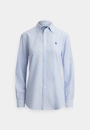 Camicia a maniche lunghe con bottoni, a righe azzurro chiaro e bianche, con colletto classico e piccolo logo sul petto a sinistra. Tessuto in cotone.