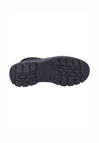 Suela de bota de goma negra con un patrón de textura, que presenta surcos profundos y secciones elevadas para una mejor tracción. Material duradero, diseño plano.