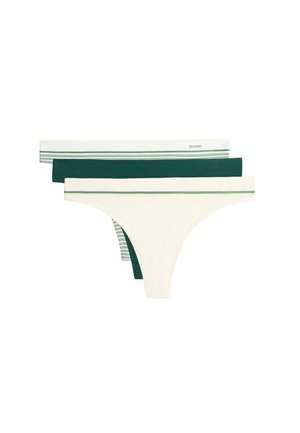 Tri dámske bezšvové bavlnené tangá nohavičky v bielej, tmavozelenej a bielej s zelenými prúžkami, zložené a usporiadané horizontálne.