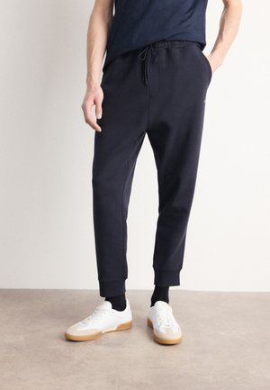 HADIKO - Tracksuit bottoms - dark blue