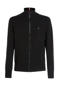 Svart heldraget tröja med ribbad krage, ärmslut och fåll, med en liten röd, vit och blå flagg-logotyp på vänster bröst.