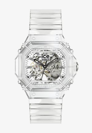 Prozirni ručni sat s vidljivim unutarnjim zupčanicima, crnim označenim kazaljkama za sate i minute te logom "ice watch" na brojčaniku.
