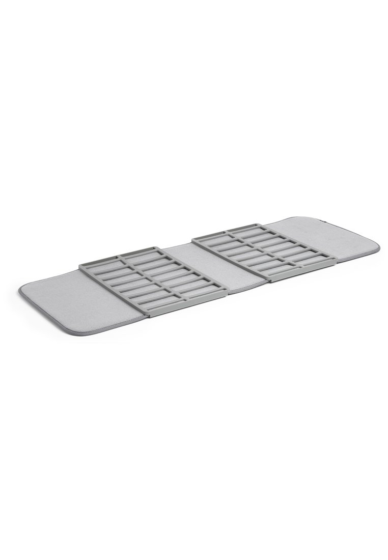 Tapis pliant gris avec une surface texturée et deux supports rectangulaires en lattes au centre, conçu pour la stabilité et le confort.