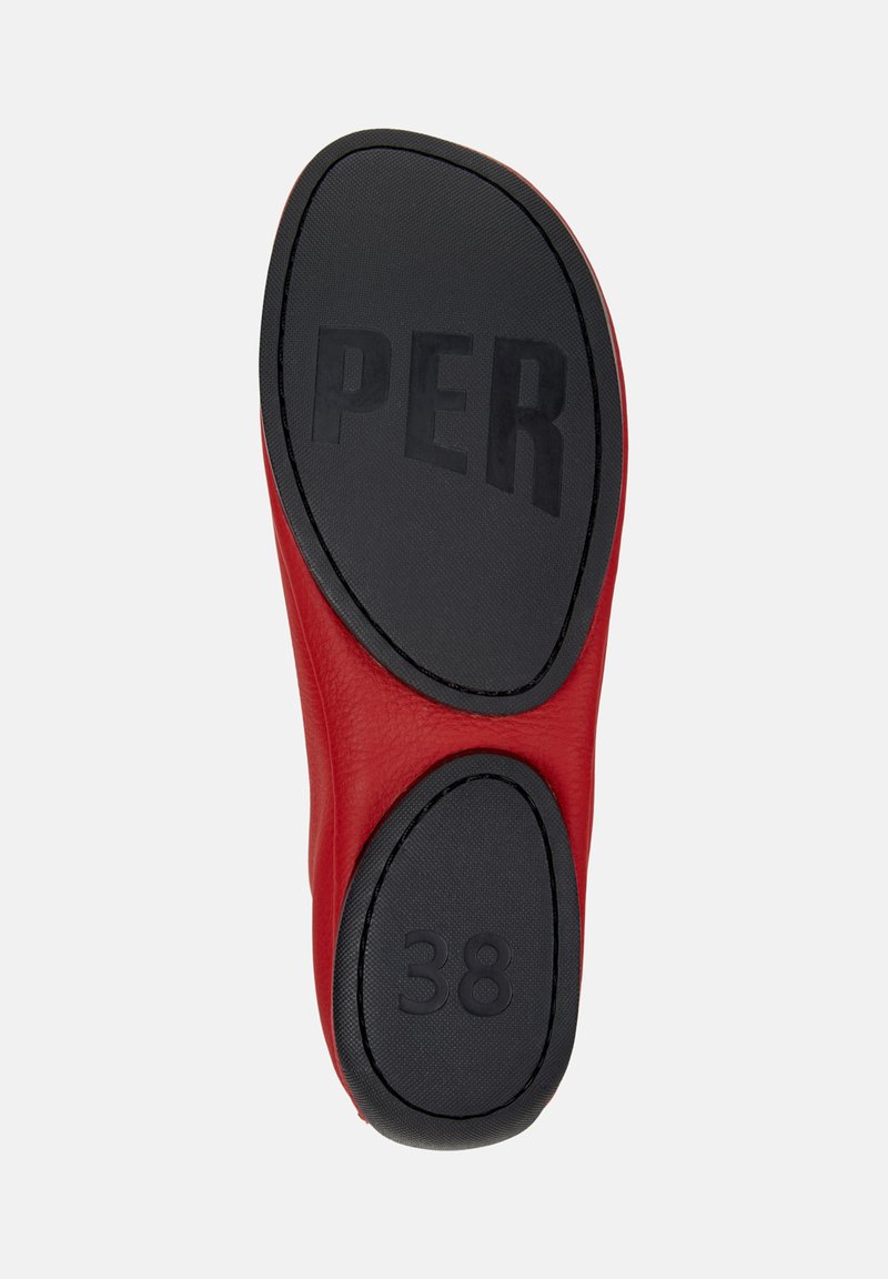 Red shoe sole with a black rubber bottom, featuring the text "PER" and the size "38" clearly marked.