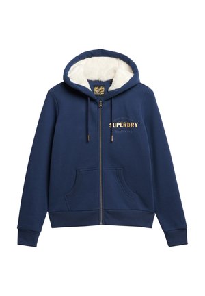 Marineblauer Hoodie mit einem Frontreißverschluss, weichem weißen Fleece-Futter, zwei vorderen Taschen und goldener "SUPERDRY"-Aufschrift auf der Brust.