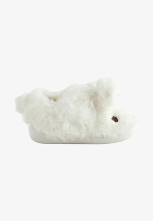 Hvide pelsede tøfler med en fluffy tekstur, rund form og bløde kaninører. Har en ensfarvet hvid sål og brune næse-detaljer.