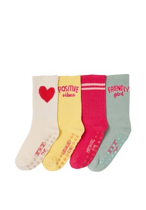 Four colorful ribbed socks in cream, yellow, pink, and light blue with textured grips and positive messages: heart, "positive vibes," stripes, and "friendly girl."