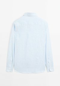 Light blue long-sleeve shirt with white stripes, buttoned cuffs, and a classic collar. Smooth texture and curved hem design.