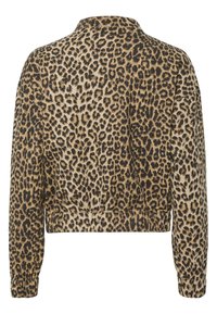 Kappad jacka i leopardmönster med beige bakgrund och svarta fläckar. Långa ärmar och elastisk fåll, tillverkad av mjukt tyg.