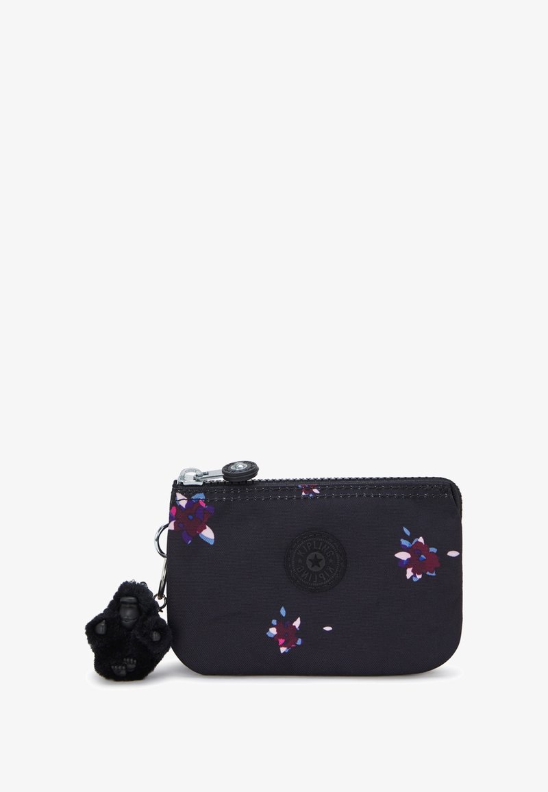 Black zippered wallet with floral pattern in purple and white, featuring a round logo and a black furry gorilla charm. Durable material.